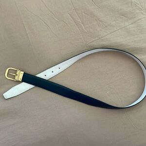 Women’s Christian Dior reversible belt, navy blue, and white with gold buckle.